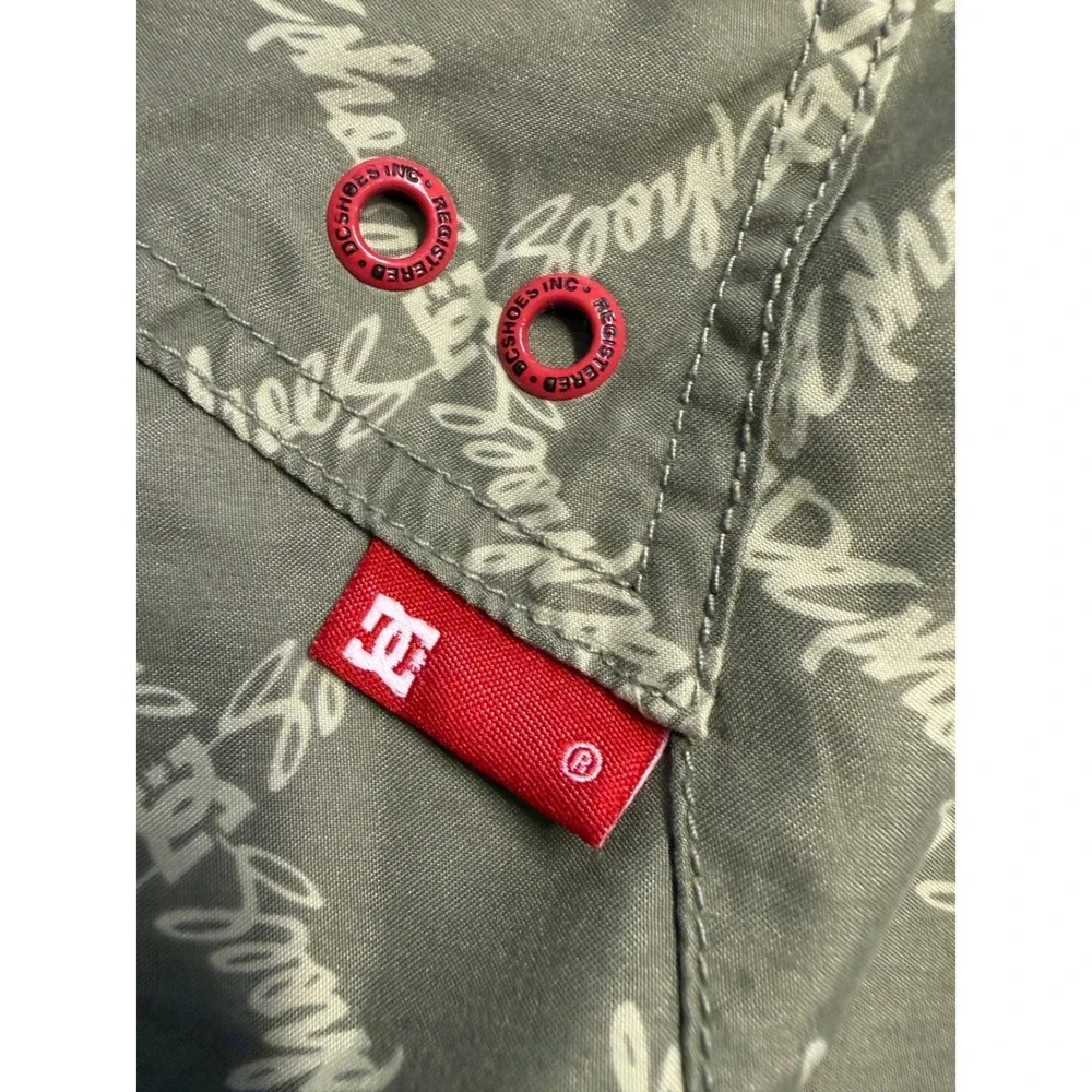 DC Shoes Mens Board Shorts Size 38 Green All Over Logo Print Swim Trunks Skate